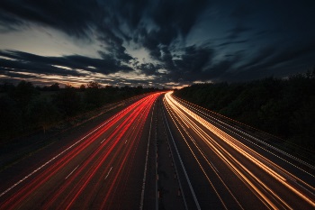 A long shot of a road at night